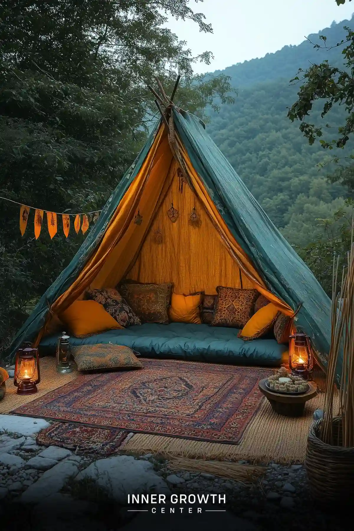 A cozy tent with colorful cushions and lanterns set in a forested mountainside for outdoor meditation.