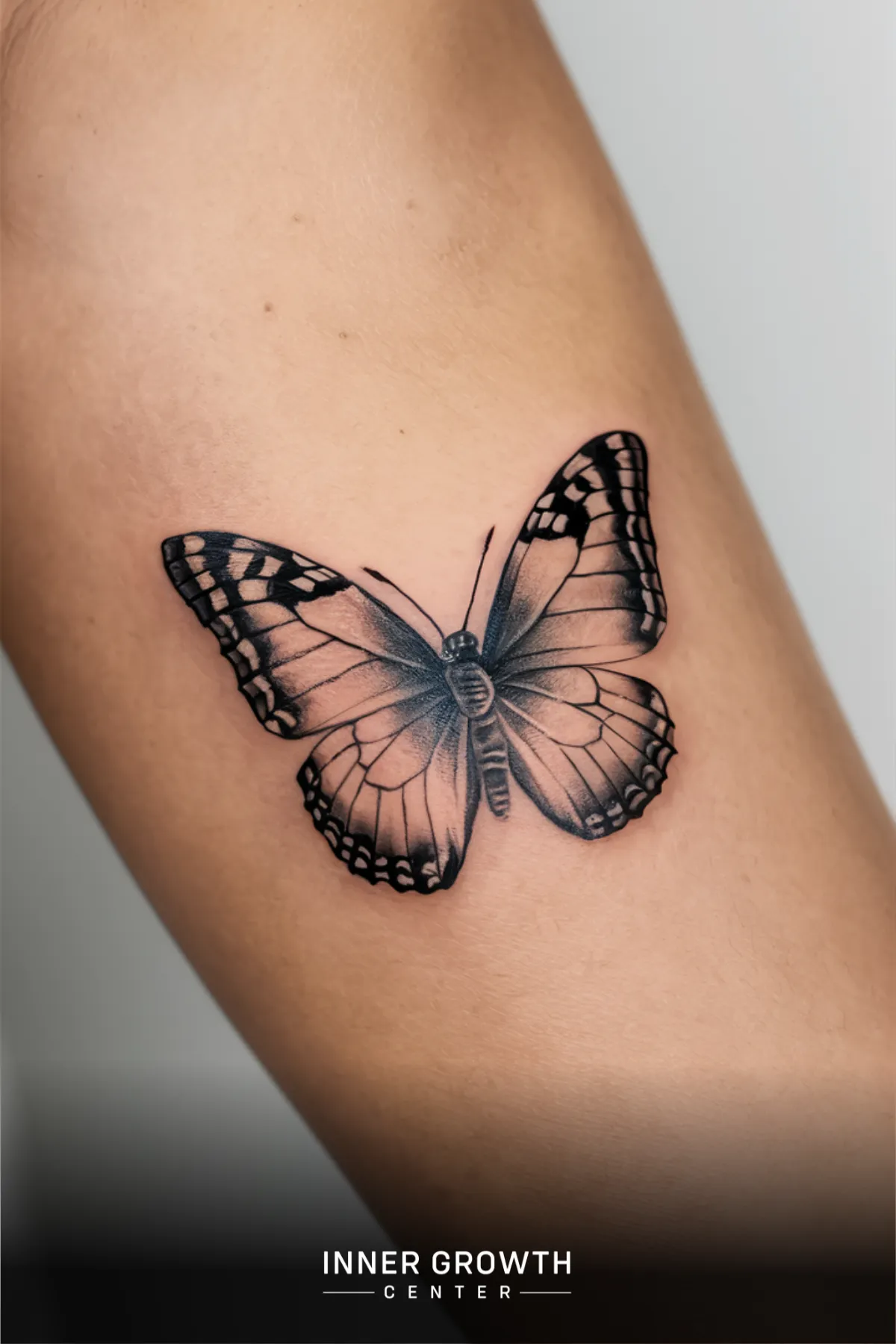 A butterfly tattoo.