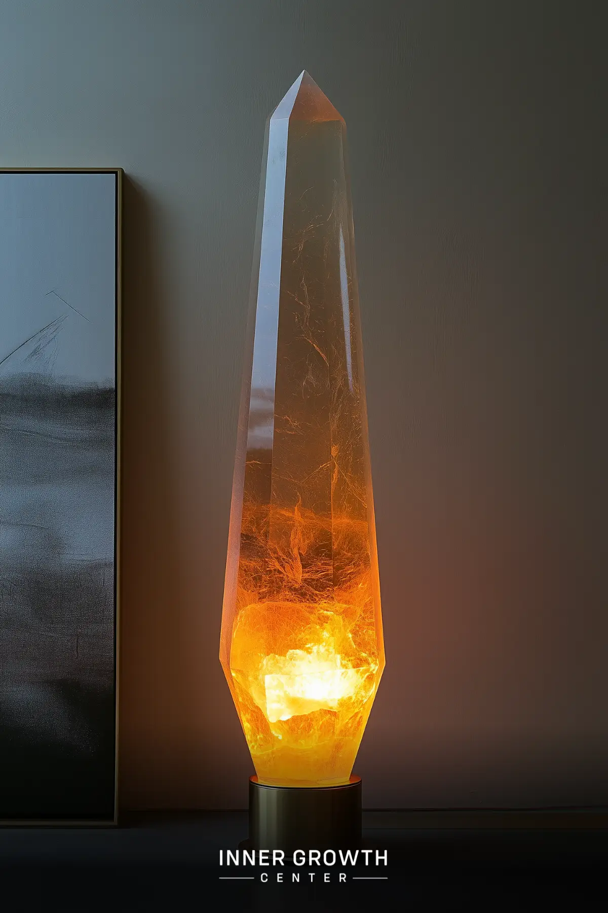 Tall obelisk-shaped lamp with glowing orange interior resembling fiery energy or lava.