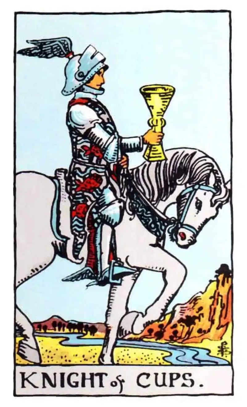 A knight on a horse holding a cup as the knight of cups tarot card.