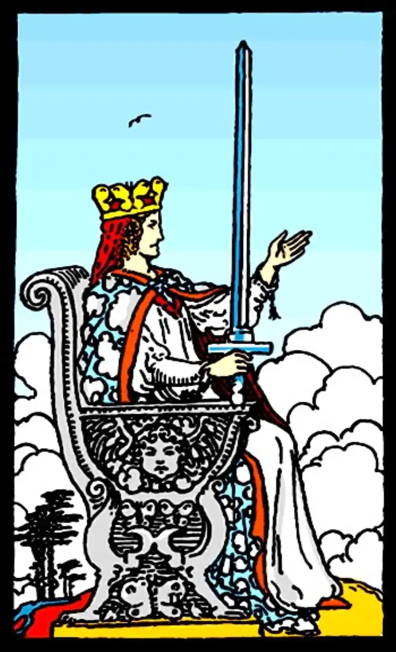 A queen sits upon a stone throne holding a sword as the queen of swords tarot card.