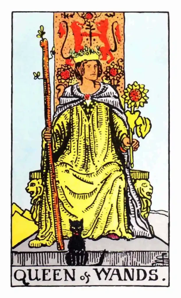 Queen of Wands Tarot card showing a queen sitting on a lion throne holding a sun flower with a blossoming staff