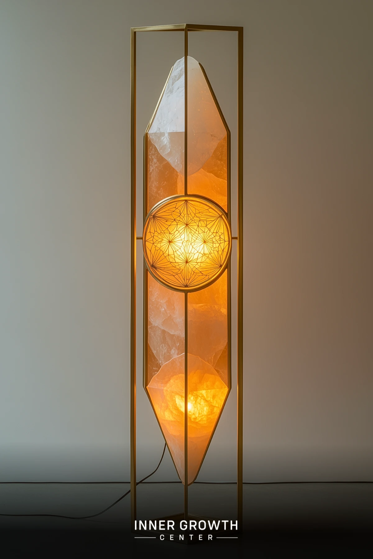 Tall lamp with elongated crystal shape and glowing circular center featuring intricate geometric patterns.