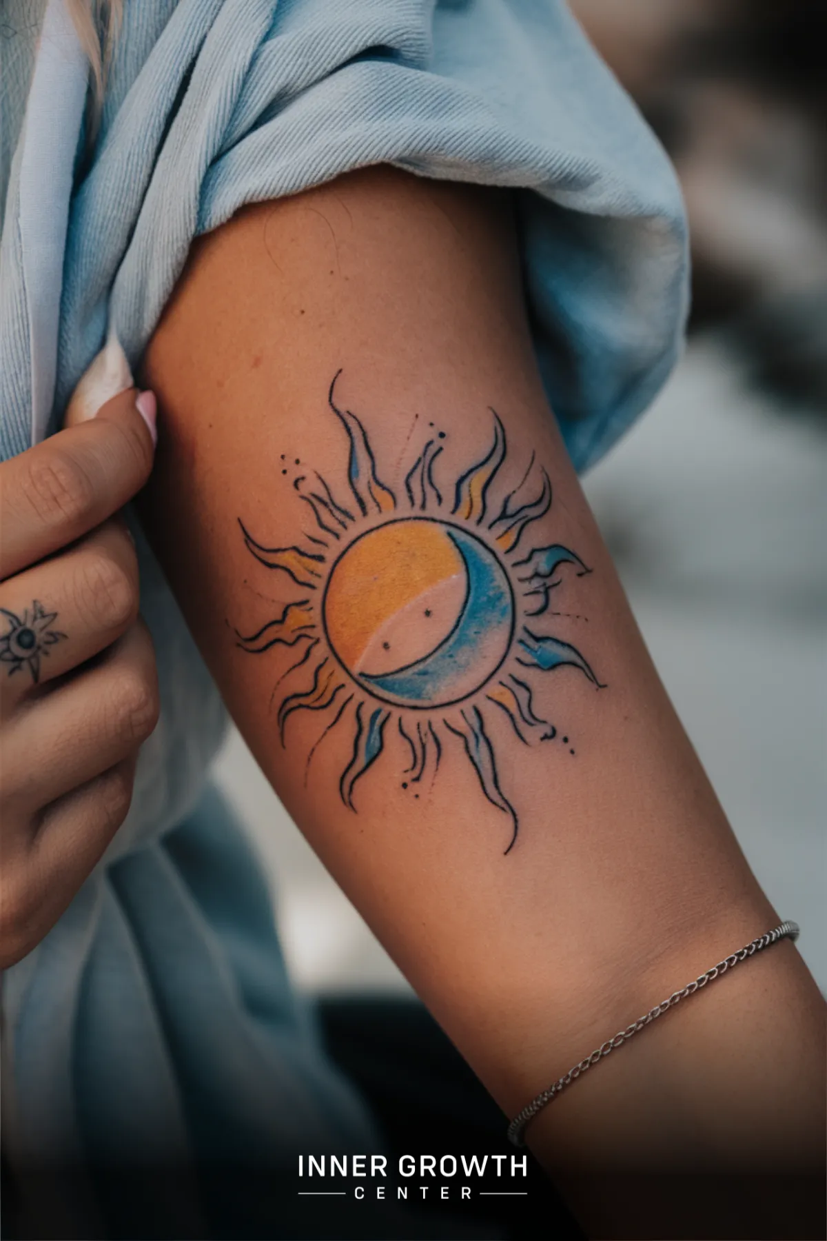 A sun and moon tattoo