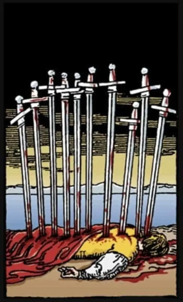 10 swords stab into a man as the ten of swords tarot card.