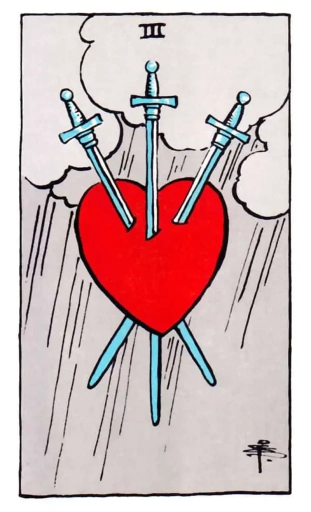 3 swords in a heart as the 3 of swords tarot card.